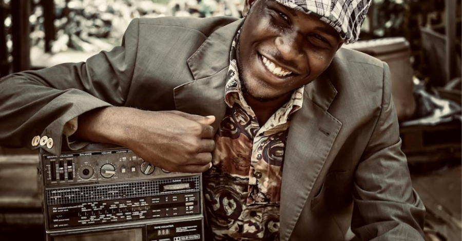 A black man with a radio